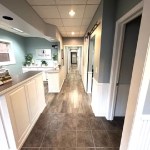 a hallway from the from of the office to treatment rooms